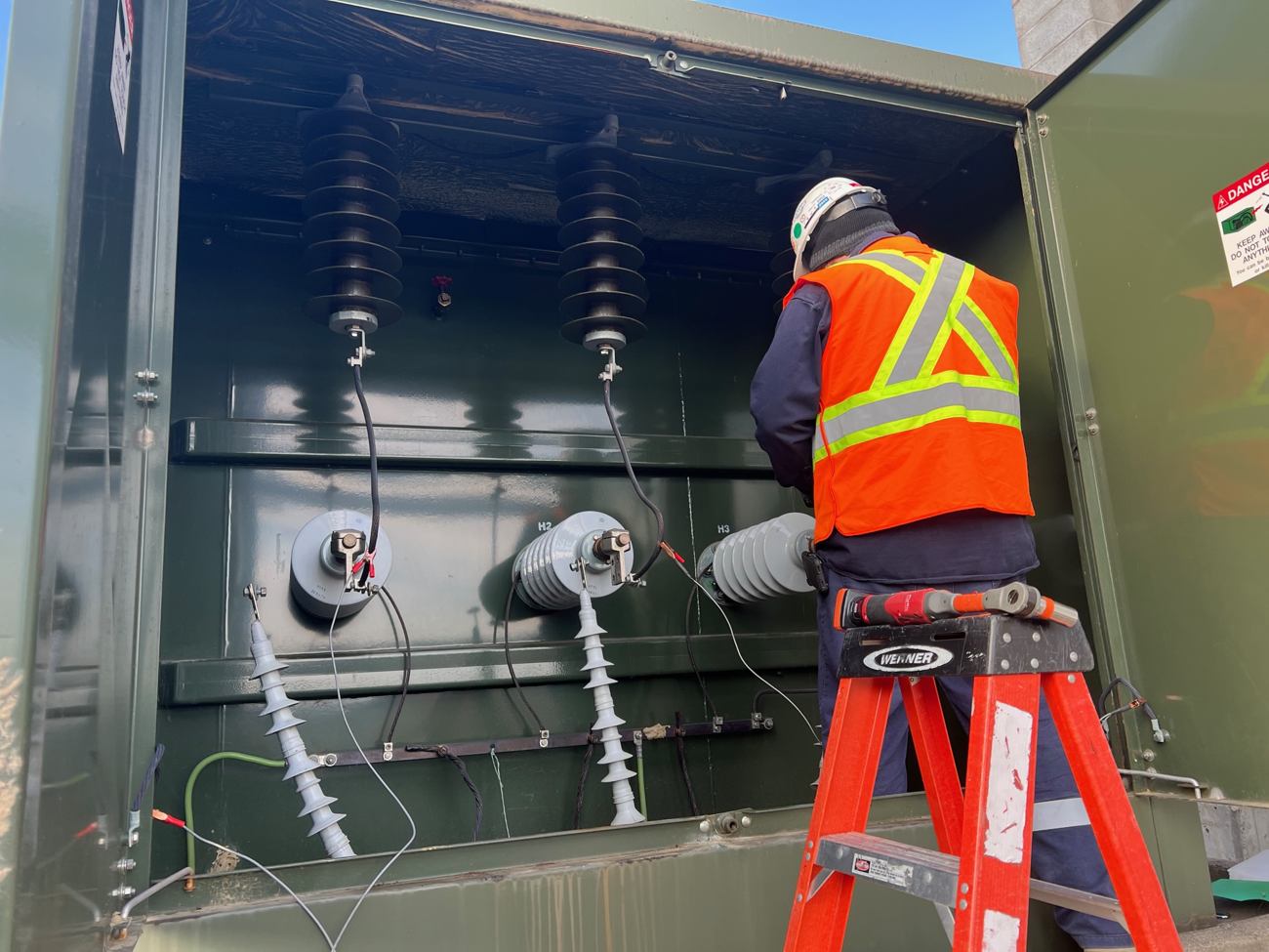 Electrical work at a commercial power installation